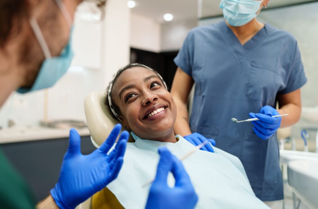 A person having a TMJ consultation with their dentist due to jaw pain.